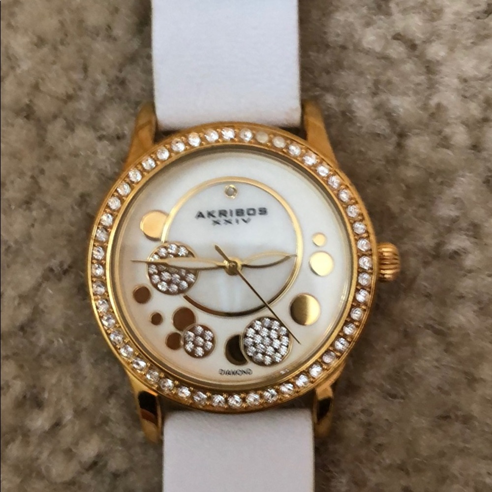 White and gold watch
